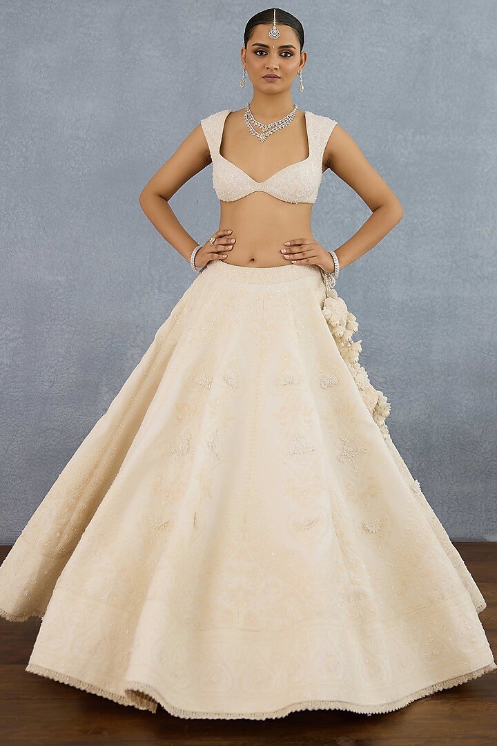 Ivory Jeni Silk & Organza Embroidered Bridal Lehenga Set by TORANI at Pernia's Pop Up Shop