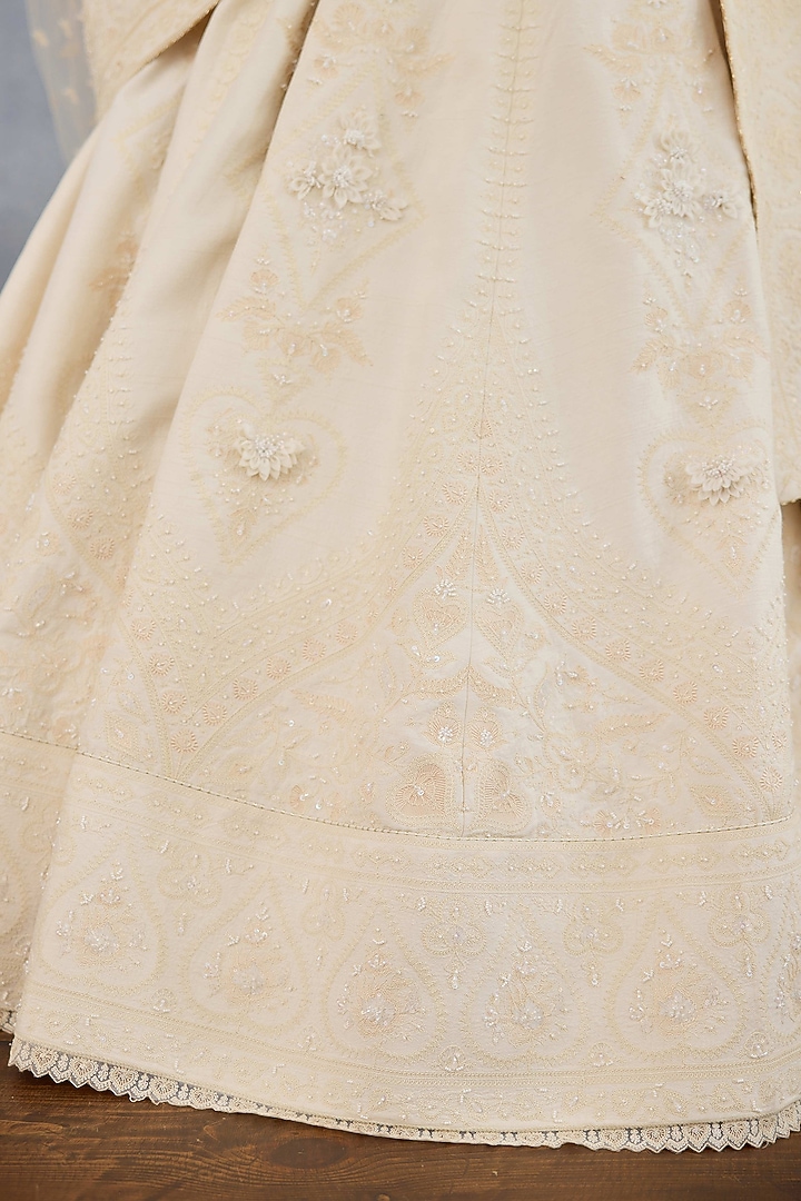 Ivory Jeni Silk & Organza Embroidered Bridal Lehenga Set by TORANI at Pernia's Pop Up Shop