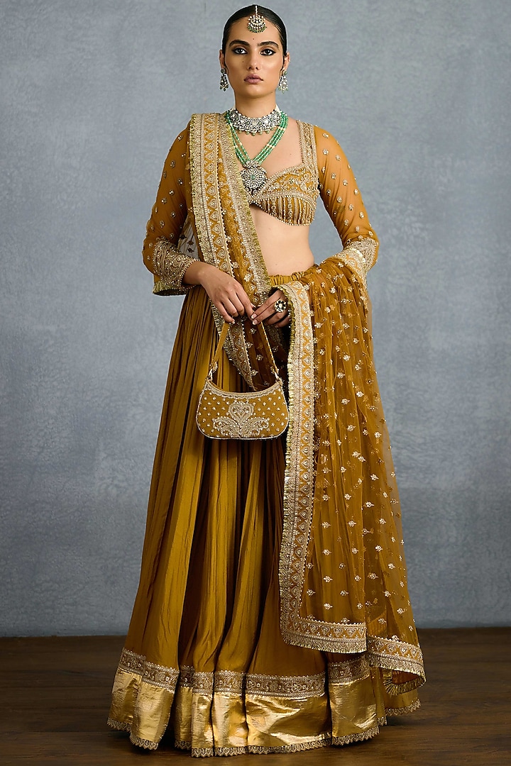 Ochre Muslin Silk & Butterfly Net Embroidered Bridal Lehenga Set by TORANI at Pernia's Pop Up Shop