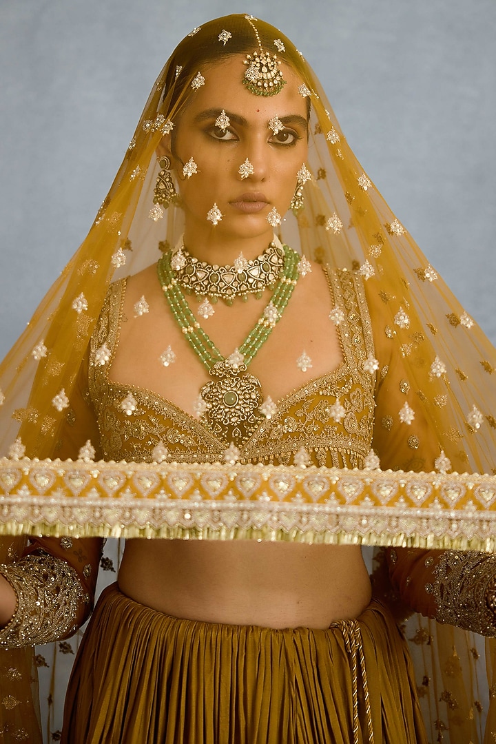 Ochre Muslin Silk & Butterfly Net Embroidered Bridal Lehenga Set by TORANI at Pernia's Pop Up Shop
