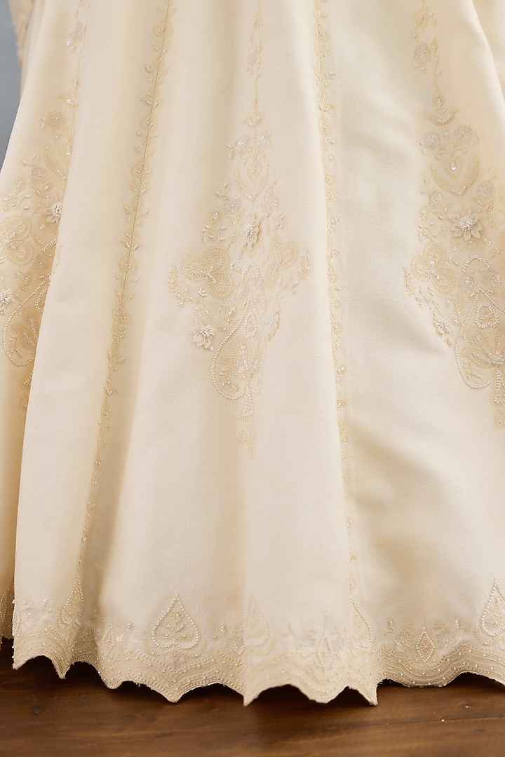 Ivory Jeni Silk & Organza Embroidered Bridal Lehenga Set by TORANI at Pernia's Pop Up Shop