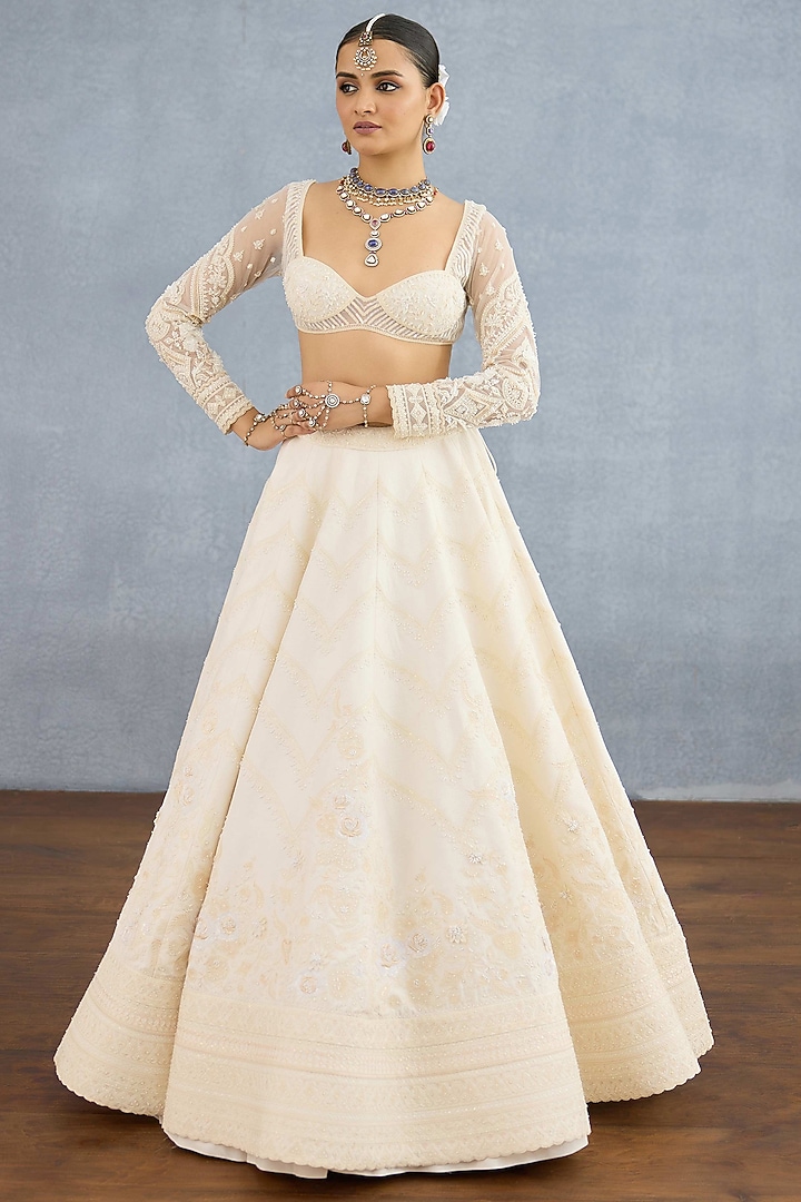 Ivory Jeni Silk & Organza Embroidered Bridal Lehenga Set by TORANI at Pernia's Pop Up Shop