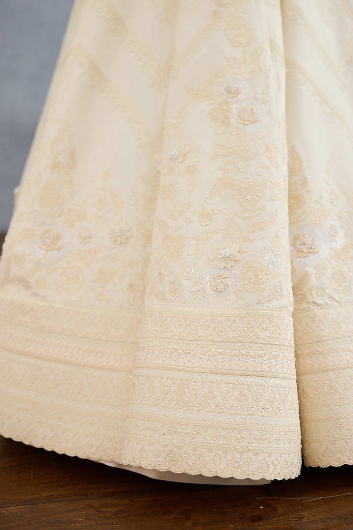 Ivory Jeni Silk & Organza Embroidered Bridal Lehenga Set by TORANI at Pernia's Pop Up Shop