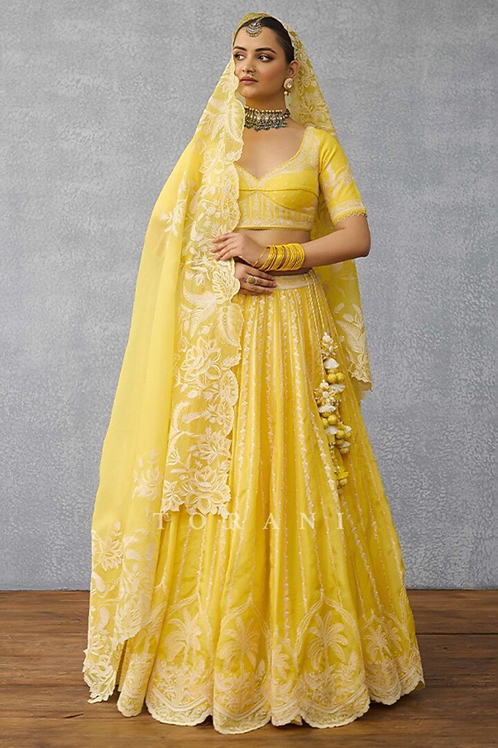 Yellow Silk Hand Embroidered Bridal Lehenga Set by TORANI at Pernia's Pop Up Shop
