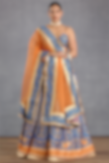 Persian Blue Raw Silk Printed & Embroidered Lehenga Set by TORANI