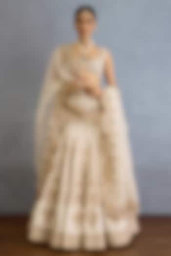Ivory Jeni Silk & Organza Hand Embroidered Bridal Lehenga Set by TORANI at Pernia's Pop Up Shop