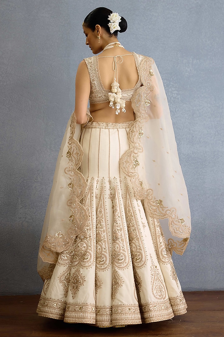 Ivory Jeni Silk & Organza Hand Embroidered Bridal Lehenga Set by TORANI at Pernia's Pop Up Shop