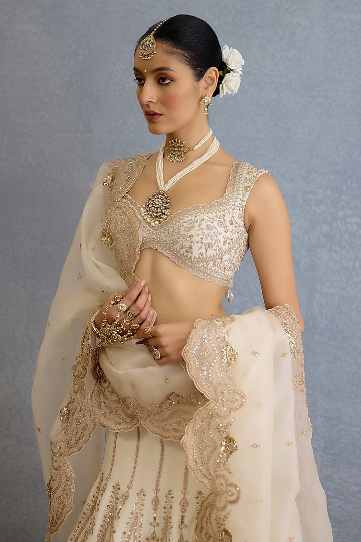 Ivory Jeni Silk & Organza Hand Embroidered Bridal Lehenga Set by TORANI at Pernia's Pop Up Shop