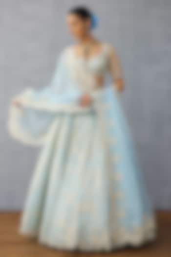 Blue Organza Tropical Motif Hand Embroidered Bridal Lehenga Set by TORANI at Pernia's Pop Up Shop