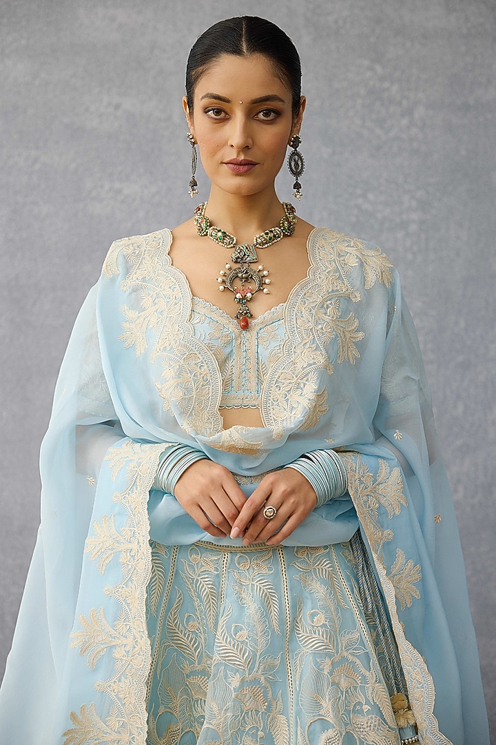Blue Organza Tropical Motif Hand Embroidered Bridal Lehenga Set by TORANI at Pernia's Pop Up Shop