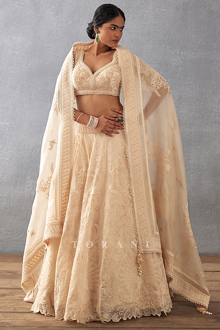 Ivory Silk Organza Hand Embroidered Bridal Lehenga Set by TORANI at Pernia's Pop Up Shop