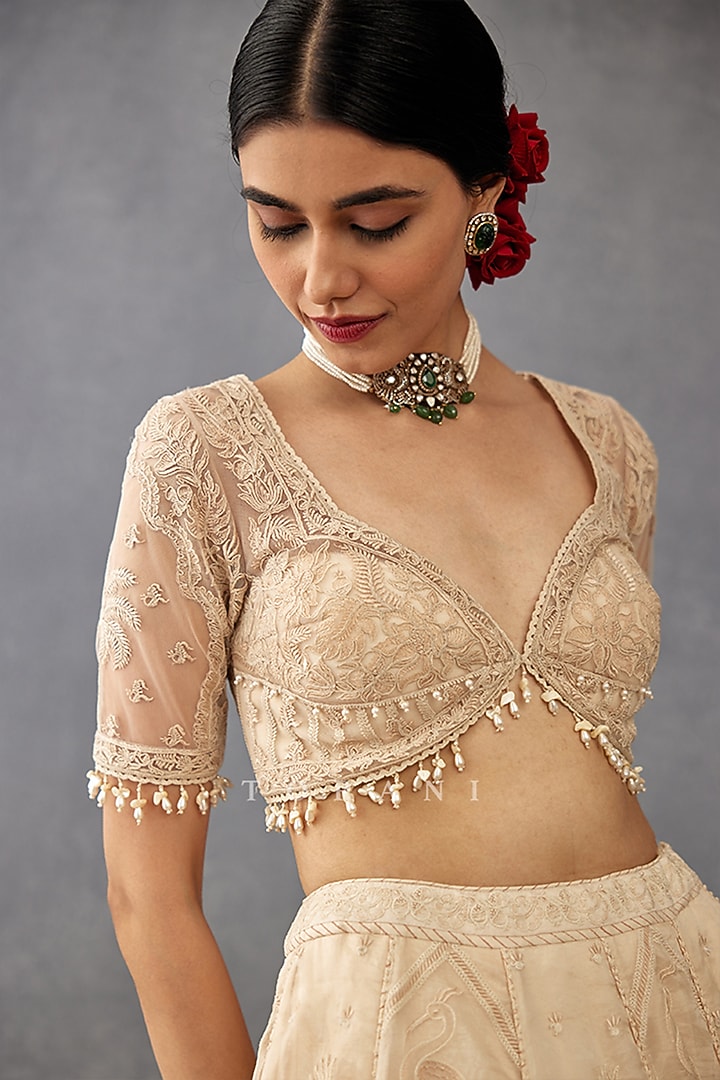 Ivory Silk Organza Hand Embroidered Bridal Lehenga Set by TORANI at Pernia's Pop Up Shop