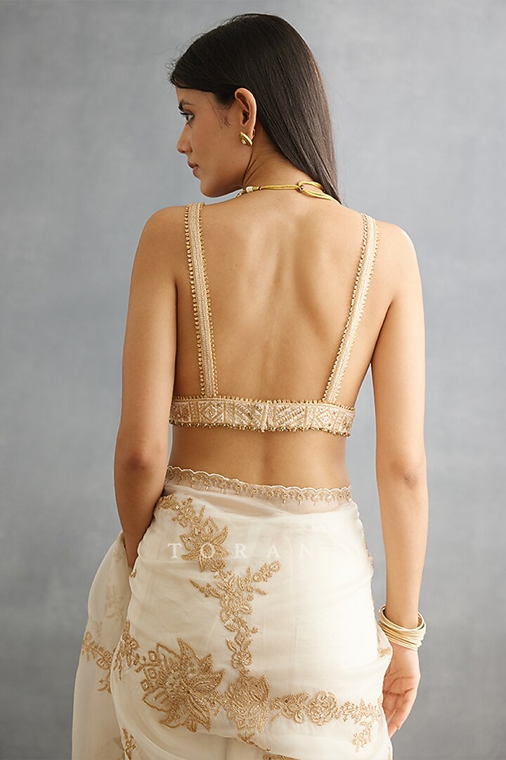 Ivory Raw Silk & Cotton Silk Embroidered Blouse by TORANI at Pernia's Pop Up Shop