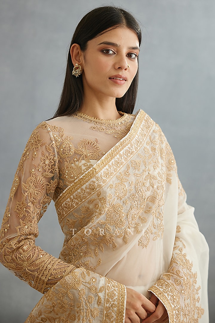 Ivory Silk Organza Embroidered Reception Saree by TORANI at Pernia's Pop Up Shop
