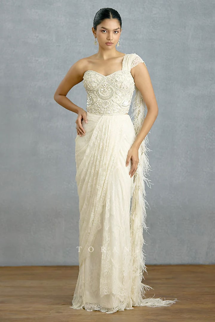 White Chantilly Lace Reception Saree by TORANI at Pernia's Pop Up Shop