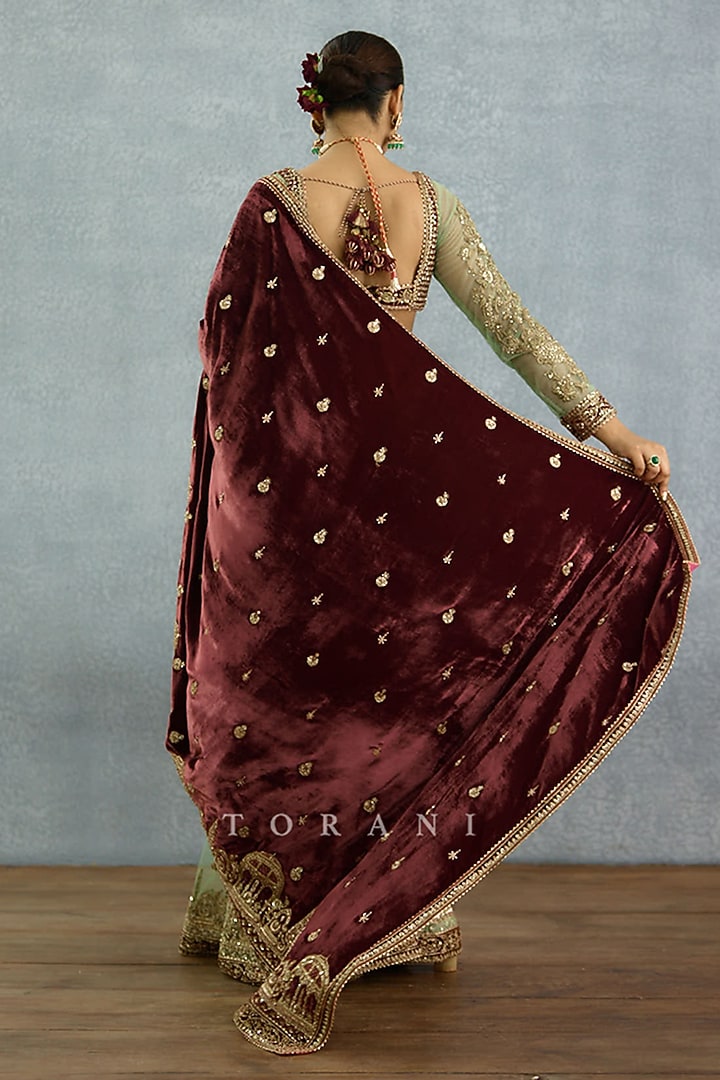 Maroon & Green Velvet Embroidered Bridal Saree by TORANI at Pernia's Pop Up Shop
