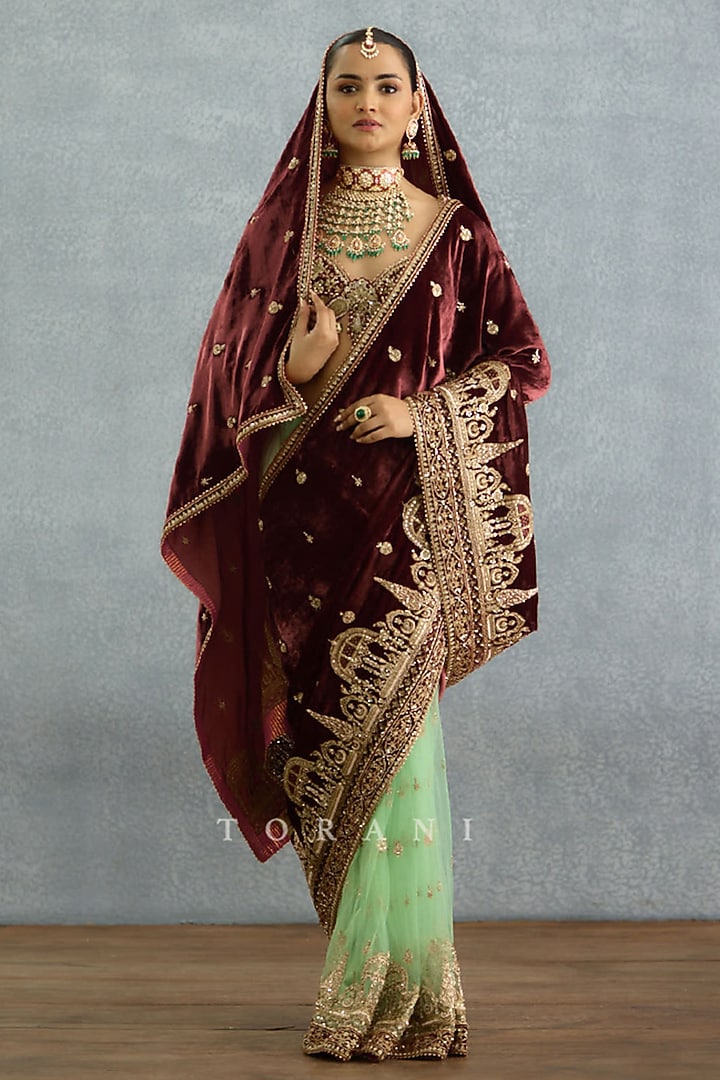 Maroon & Green Velvet Embroidered Bridal Saree by TORANI at Pernia's Pop Up Shop