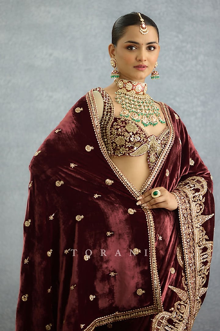 Maroon & Green Velvet Embroidered Bridal Saree by TORANI at Pernia's Pop Up Shop