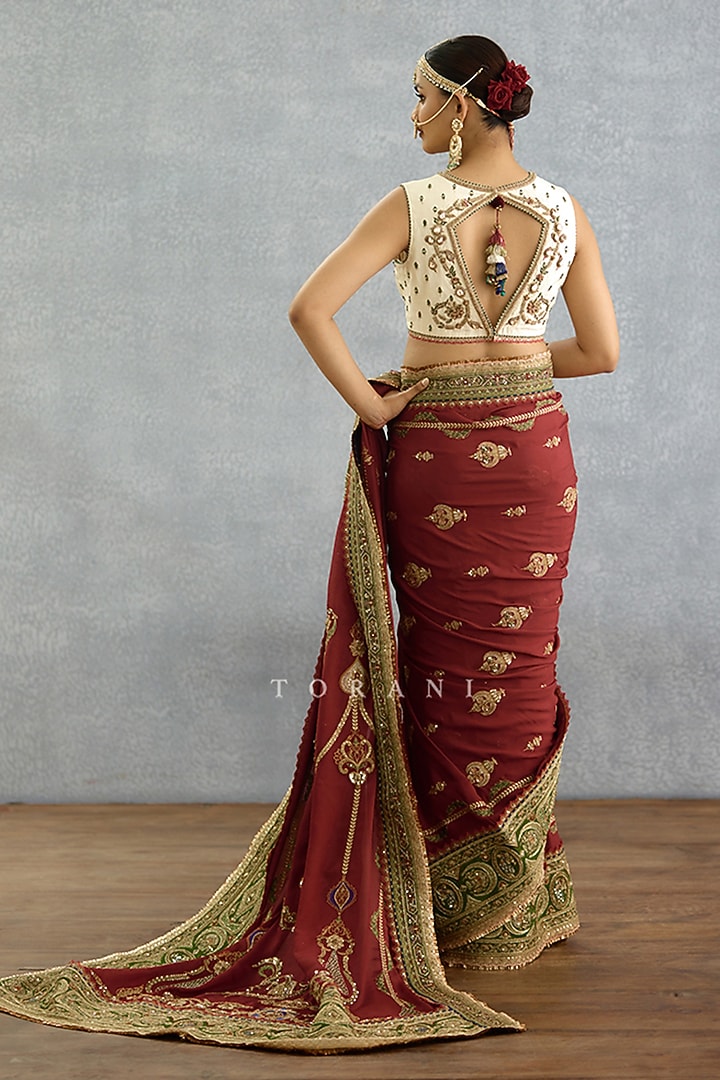 Maroon Dola Silk Dori Embroidered Bridal Saree by TORANI at Pernia's Pop Up Shop