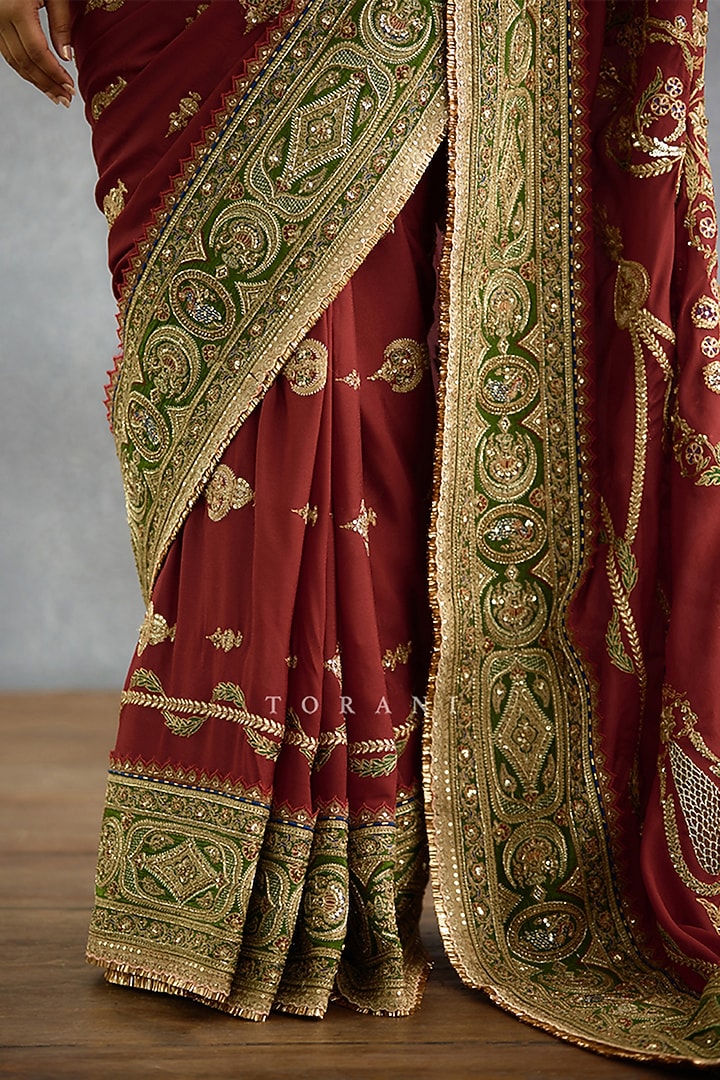 Maroon Dola Silk Dori Embroidered Bridal Saree by TORANI at Pernia's Pop Up Shop