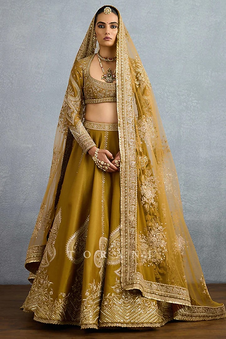 Yellow Ochre Tissue Zari Embroidered Bridal Lehenga Set by TORANI at Pernia's Pop Up Shop