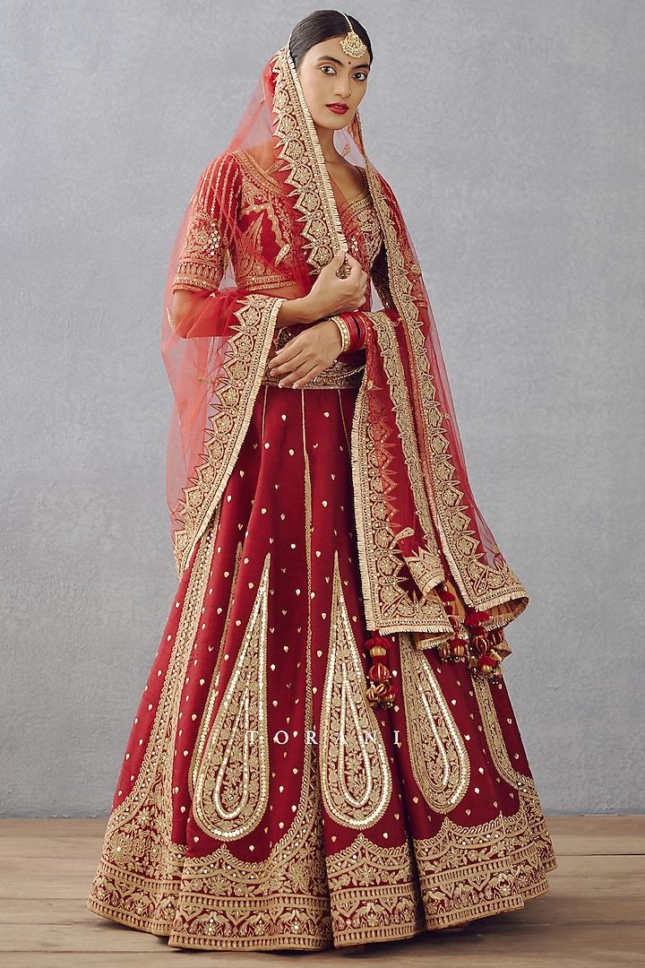 Bright Red Raw Silk Embroidered Bridal Lehenga Set by TORANI at Pernia's Pop Up Shop
