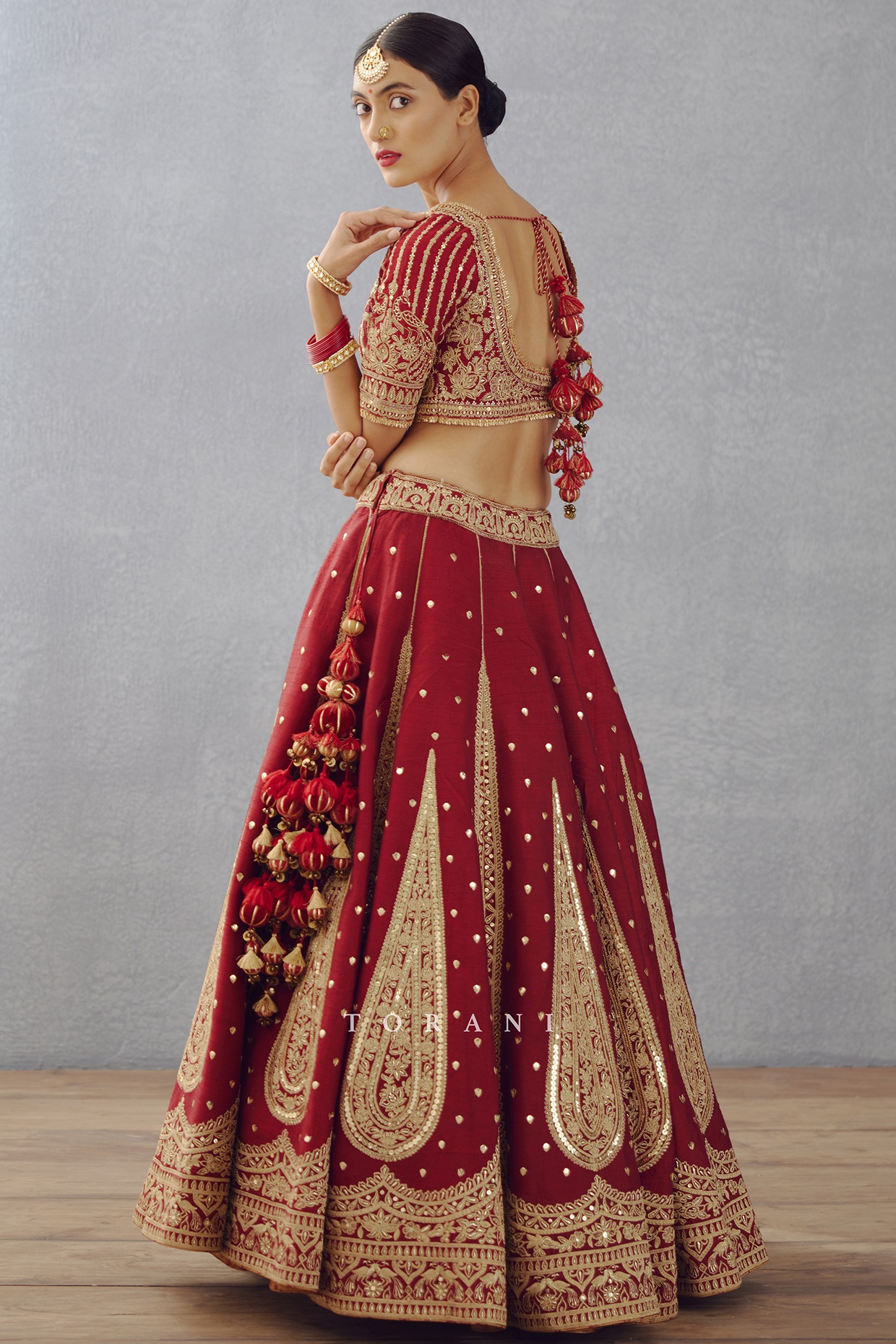 Sabyasachi red bridal lehenga – Kuro Clothing India