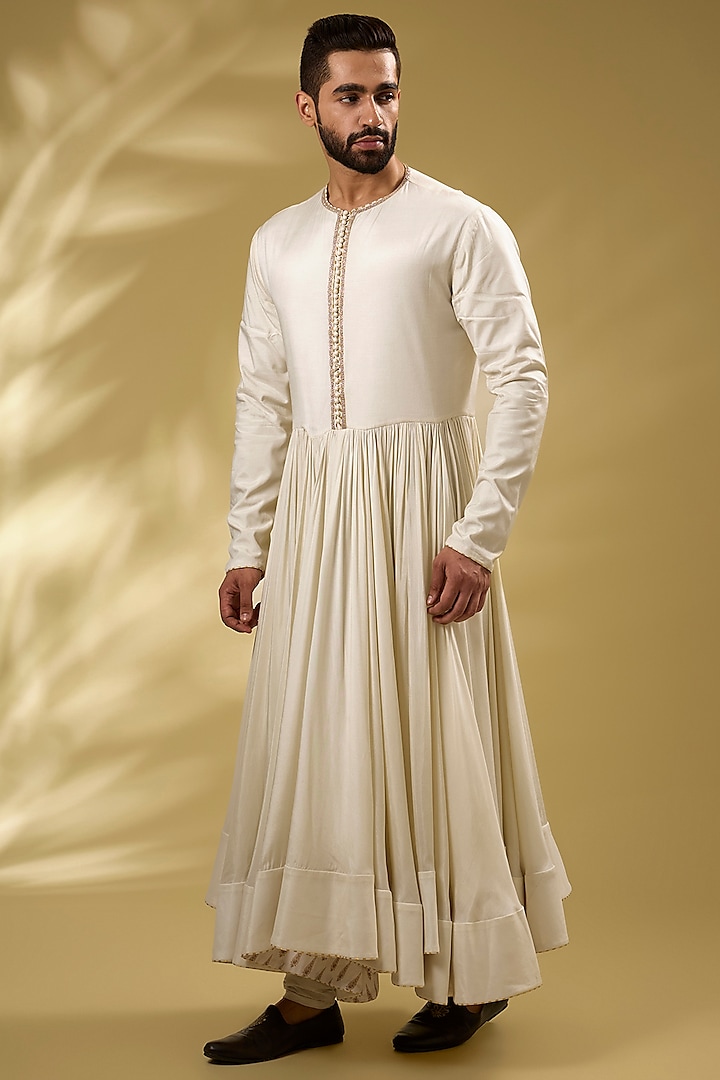 Ivory Viscose Raw Silk Gold Hand Embroidered Groom Sherwani Set by Torani Men at Pernia's Pop Up Shop