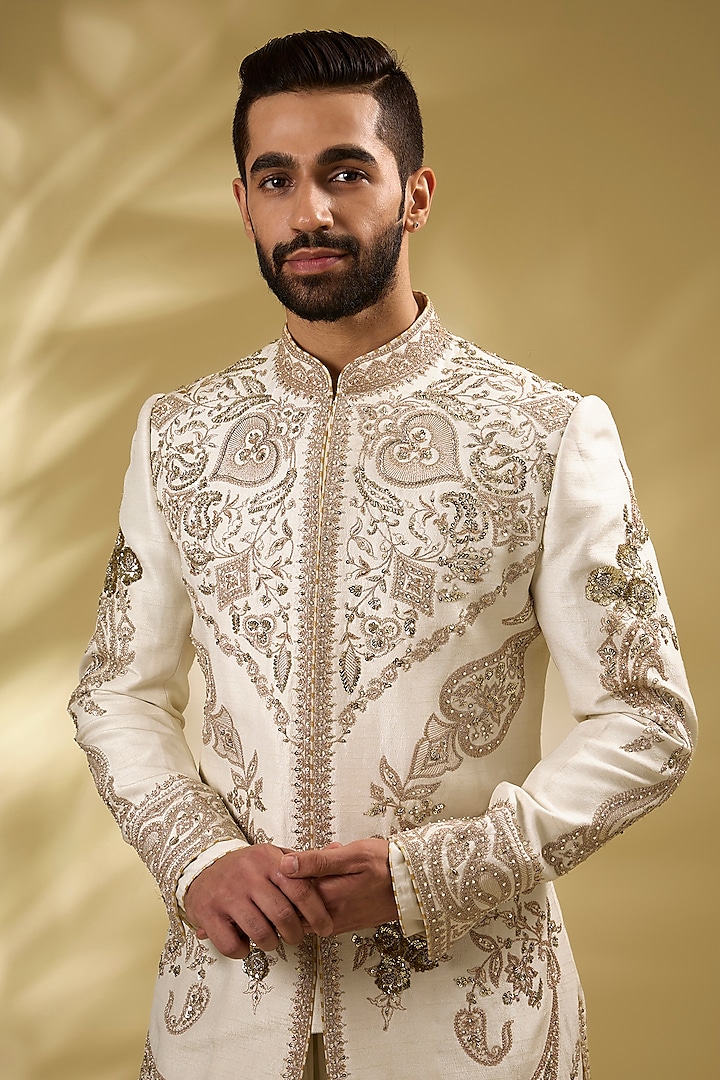 Ivory Viscose Raw Silk Gold Hand Embroidered Groom Sherwani Set by Torani Men at Pernia's Pop Up Shop