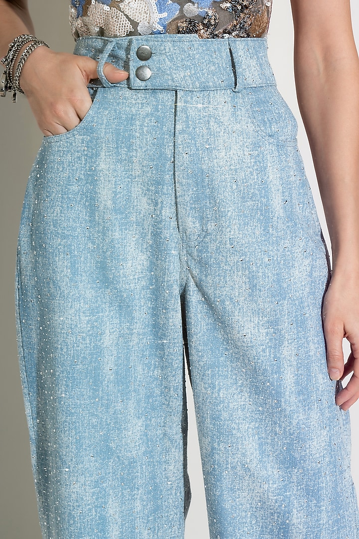 Blue Denim Embellished Jeans by TORQADORN at Pernia's Pop Up Shop
