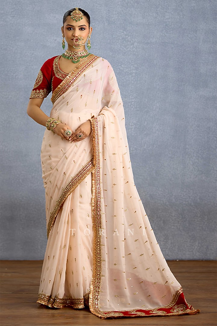 Ivory Chiffon & Jeni Silk Embroidered Reception Saree by TORANI at Pernia's Pop Up Shop