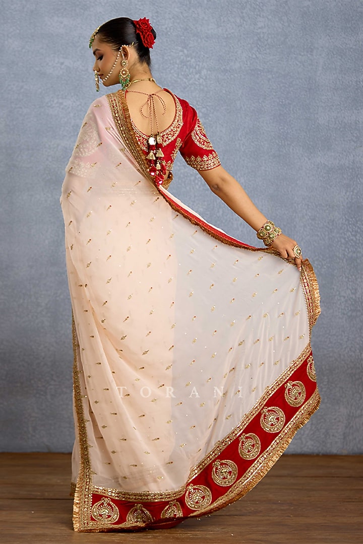 Ivory Chiffon & Jeni Silk Embroidered Reception Saree by TORANI at Pernia's Pop Up Shop