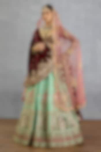 Green Silk & Net Motif Embroidered Bridal Lehenga Set by TORANI at Pernia's Pop Up Shop