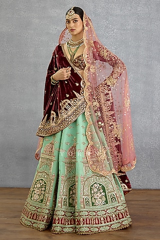 Green Silk & Net Motif Embroidered Lehenga Set by TORANI