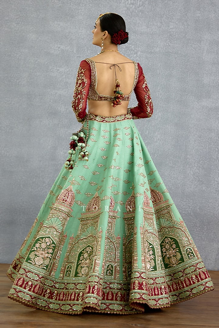 Green Silk & Net Motif Embroidered Bridal Lehenga Set by TORANI at Pernia's Pop Up Shop