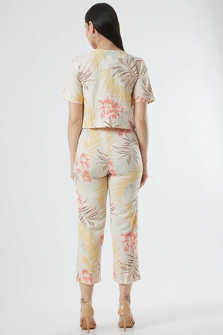 Beige Floral Printed Pants by Three Piece Company at Pernia's Pop Up Shop