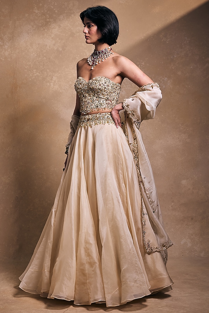 Cream Raw Silk & Organza Zari Embroidered Bridal Lehenga Set by Tamanna Punjabi Kapoor at Pernia's Pop Up Shop