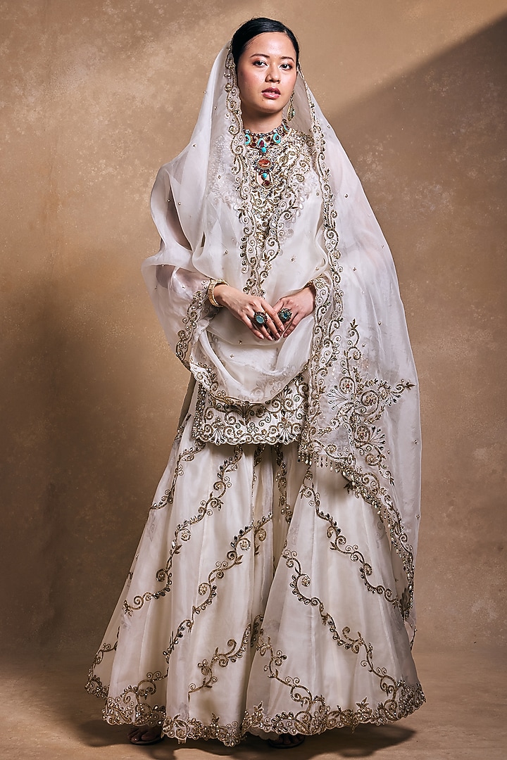 Ivory Organza & Raw Silk Zari Embroidered Gharara Set by Tamanna Punjabi Kapoor at Pernia's Pop Up Shop