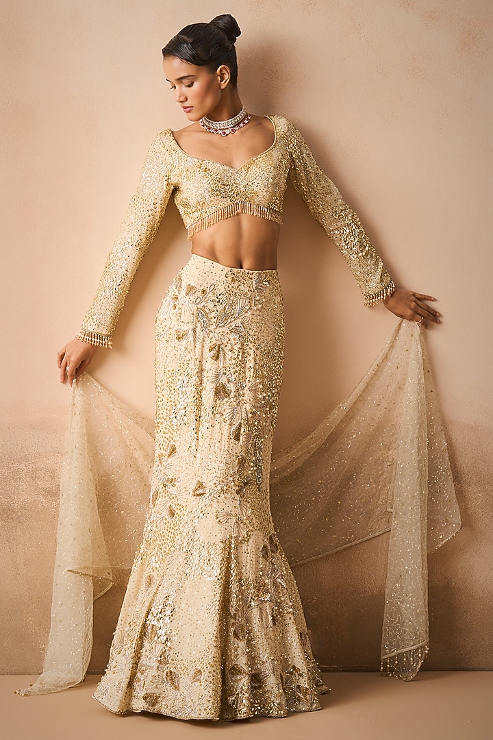 Ivory Georgette Sequins Embroidered Flared Bridal Lehenga Set by Tamanna Punjabi Kapoor at Pernia's Pop Up Shop