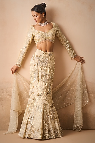 Ivory Georgette Sequins Embroidered Flared Lehenga Set by Tamanna Punjabi Kapoor