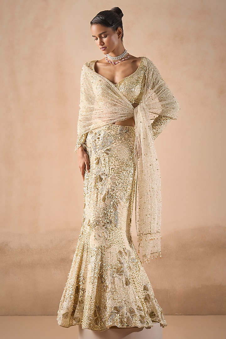 Ivory Georgette Sequins Embroidered Flared Bridal Lehenga Set by Tamanna Punjabi Kapoor at Pernia's Pop Up Shop
