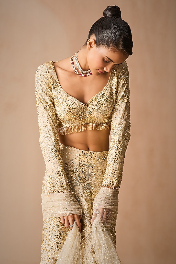 Ivory Georgette Sequins Embroidered Flared Bridal Lehenga Set by Tamanna Punjabi Kapoor at Pernia's Pop Up Shop