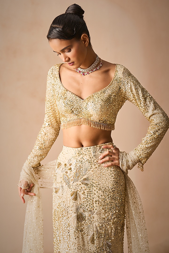 Ivory Georgette Sequins Embroidered Flared Bridal Lehenga Set by Tamanna Punjabi Kapoor at Pernia's Pop Up Shop