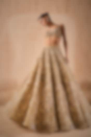 Beige Gold Tulle Sequins Embroidered Bridal Lehenga Set by Tamanna Punjabi Kapoor at Pernia's Pop Up Shop