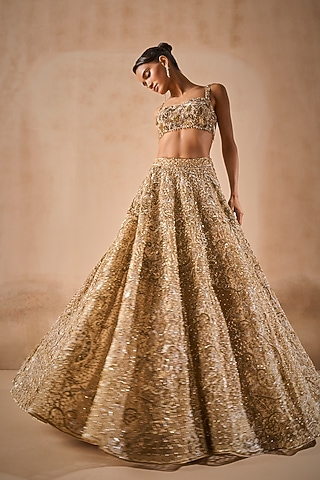 Beige Gold Tulle Sequins Embroidered Lehenga Set by Tamanna Punjabi Kapoor