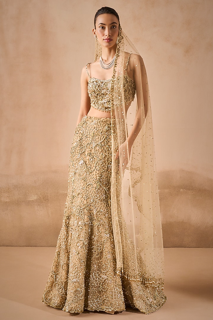 Beige Gold Tulle Sequins Embroidered Flared Bridal Lehenga Set by Tamanna Punjabi Kapoor at Pernia's Pop Up Shop