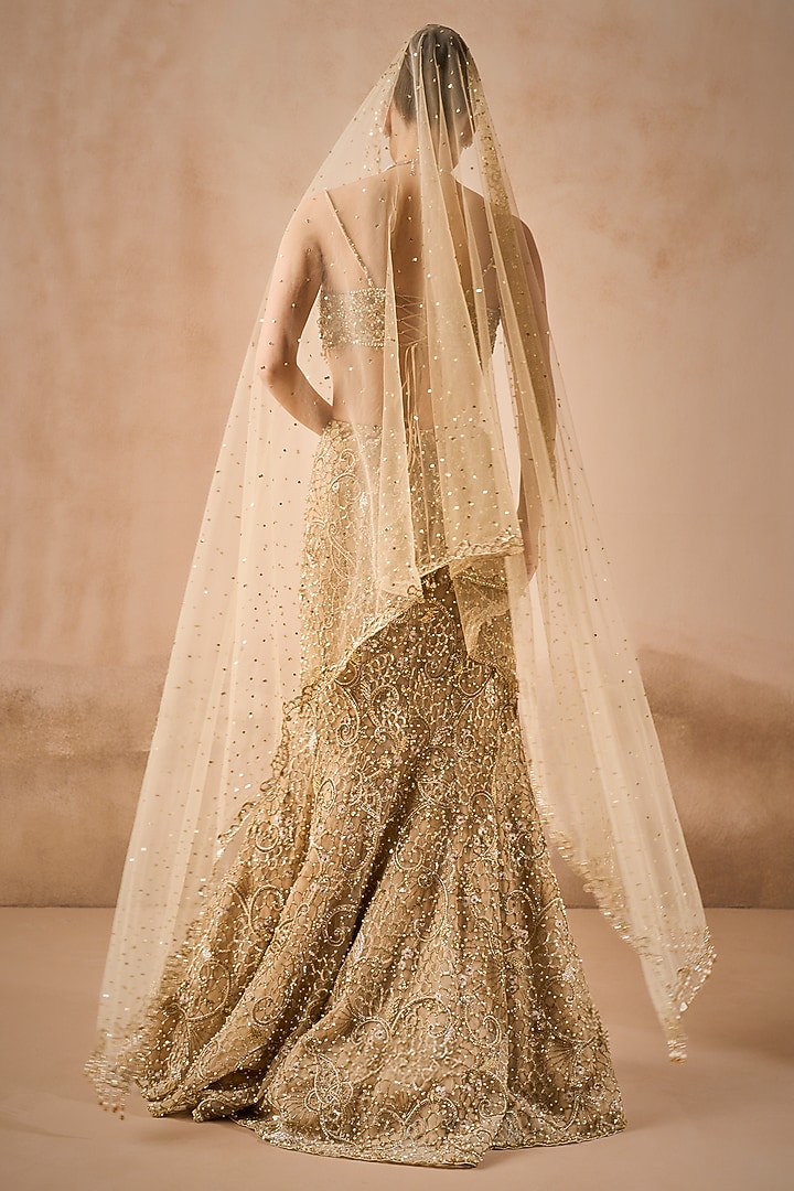 Beige Gold Tulle Sequins Embroidered Flared Bridal Lehenga Set by Tamanna Punjabi Kapoor at Pernia's Pop Up Shop