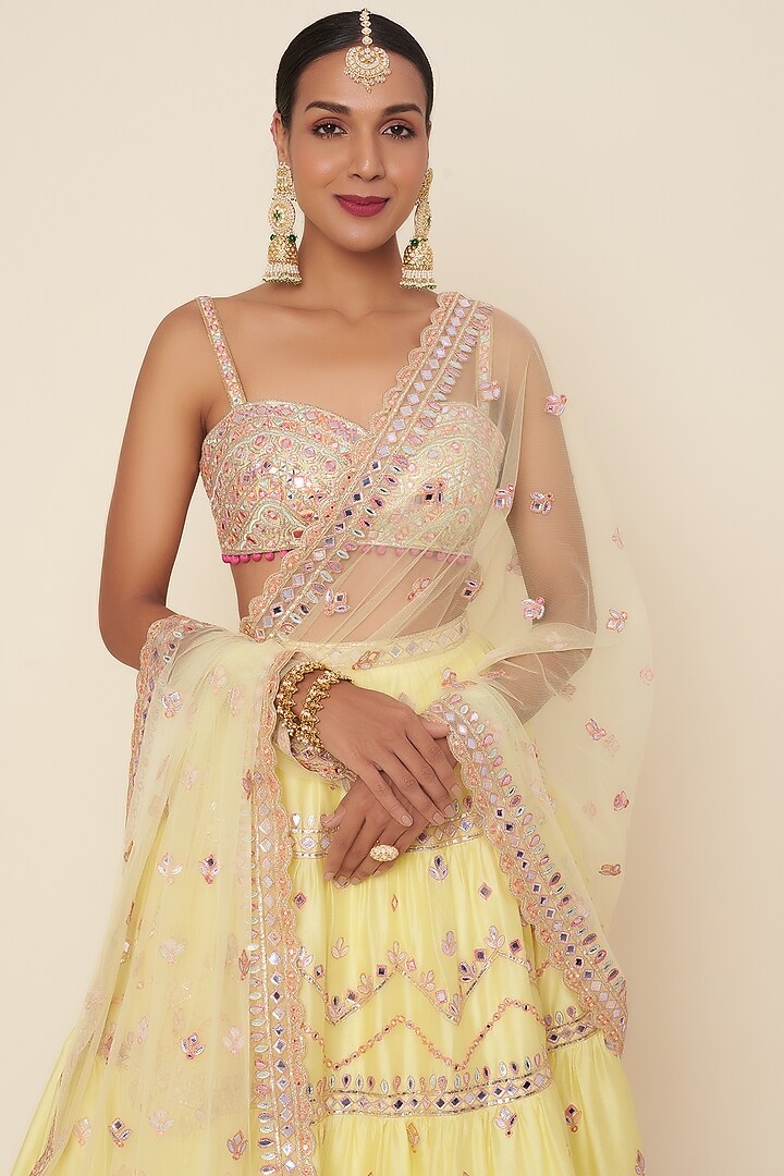 Lemon Yellow Embroidered Tiered Bridal Lehenga Set by Tamanna Punjabi Kapoor at Pernia's Pop Up Shop