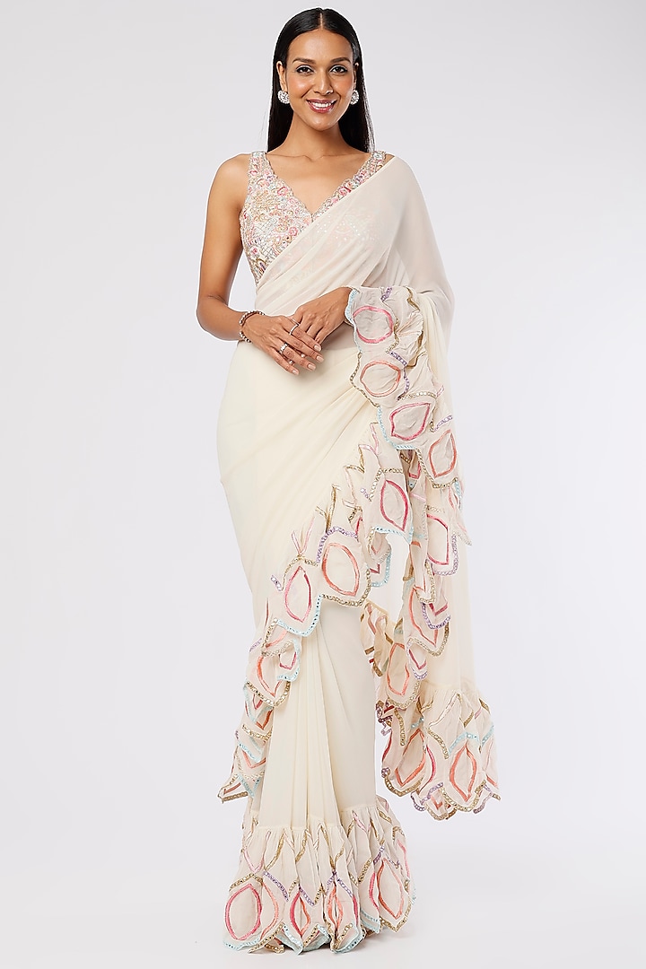 Ivory Georgette Ruffled Reception Saree Set by Tamanna Punjabi Kapoor at Pernia's Pop Up Shop
