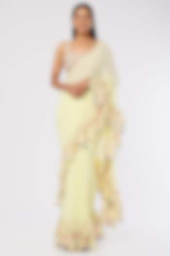 Lemon Yellow Georgette Ruffled Saree Set by Tamanna Punjabi Kapoor at Pernia's Pop Up Shop